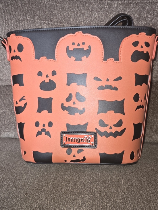 Loungefly Handbags - Loungefly Orange and Black Pumpkin Faces Bucket Bag